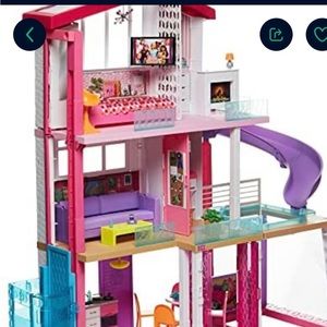 Lol doll house and Barbie doll house asking for 200 each house wit accessories